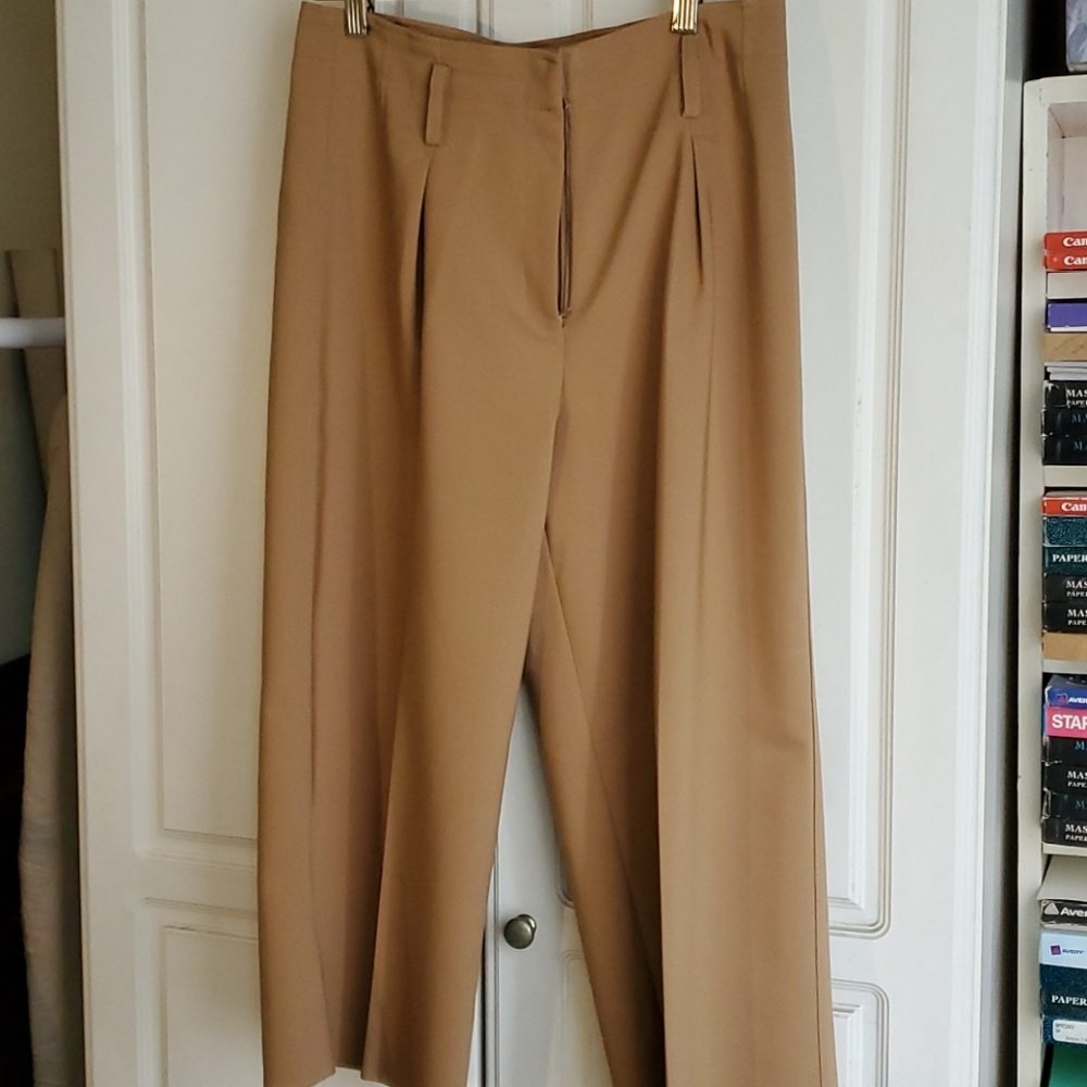 A great look with boots!  Stylishly wide, pleated-front pants